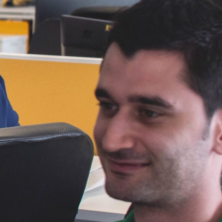 a man smiling for the camera